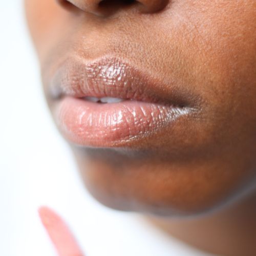 The 10 Best Lip Balms, Glosses & Treatments to Get Hydrated Lips All